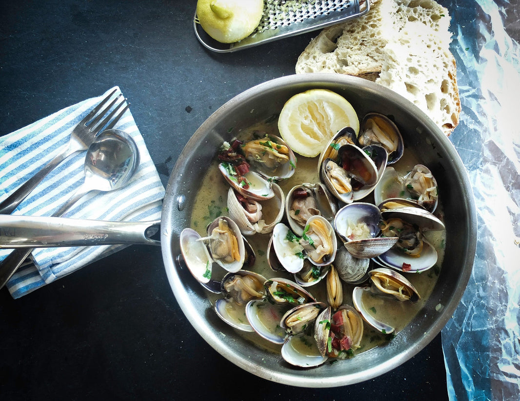 BBQ Pipis tossed in Garlic Butter with Bacon, Lemon, Capers & Tarragon
