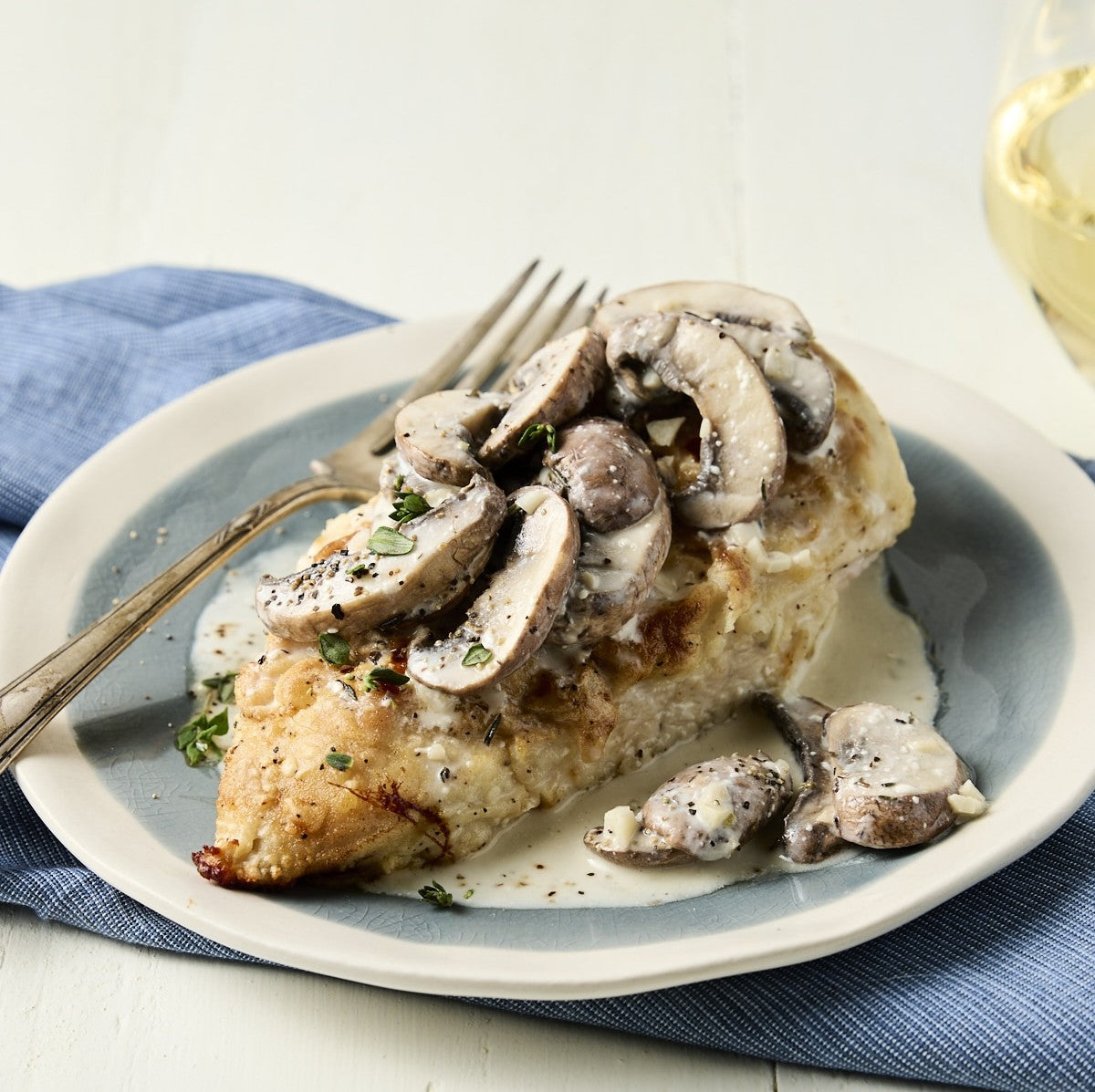 Pan roasted chicken breast, creamy Chardonnay and roast mushroom sauce.